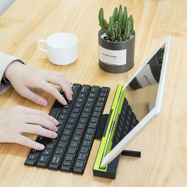 Multifunction Wireless Bluetooth Keyboard with Holder Foldable Universal Mobile Phone Tablet IPAD.